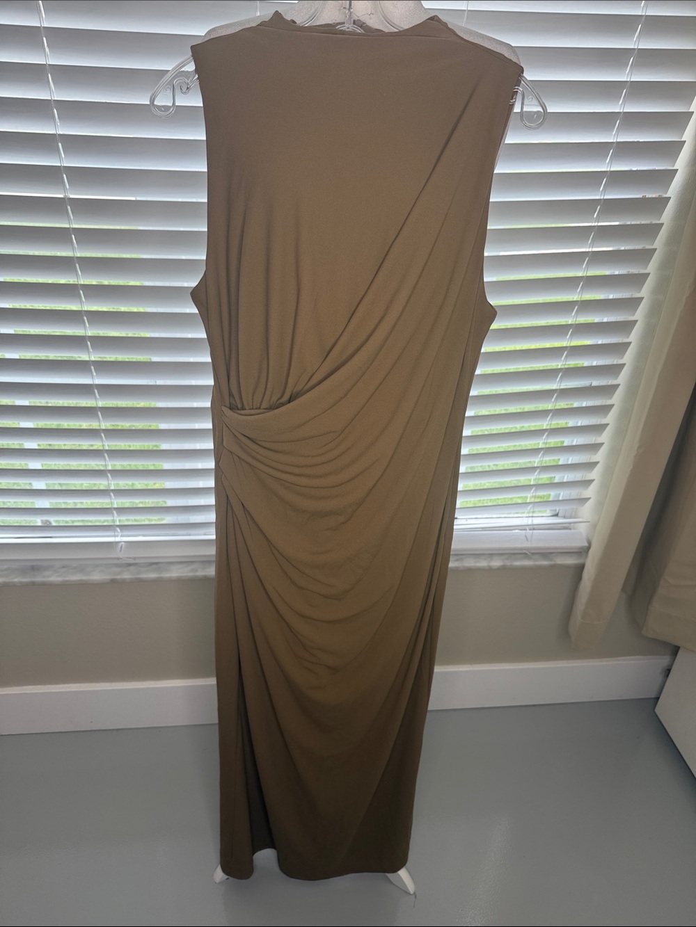Elegant sleeveless maxi dress in a warm olive-taupe (khaki) shade